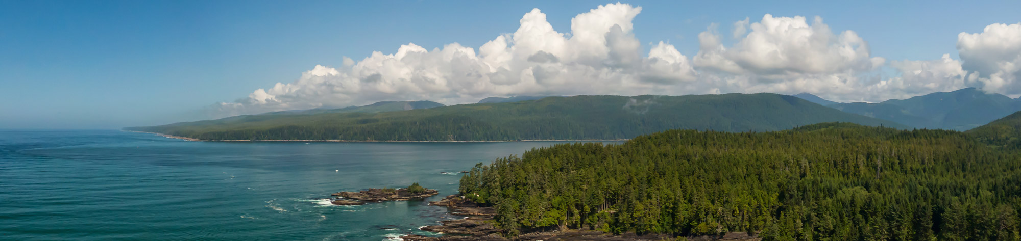 Panoramic Landscape View of the Rocky Pacific Ocean Coast in the Southern Vancouver Island during a sunny summer day. Taken between Victoria and Port Renfrew, British Columbia, Canada