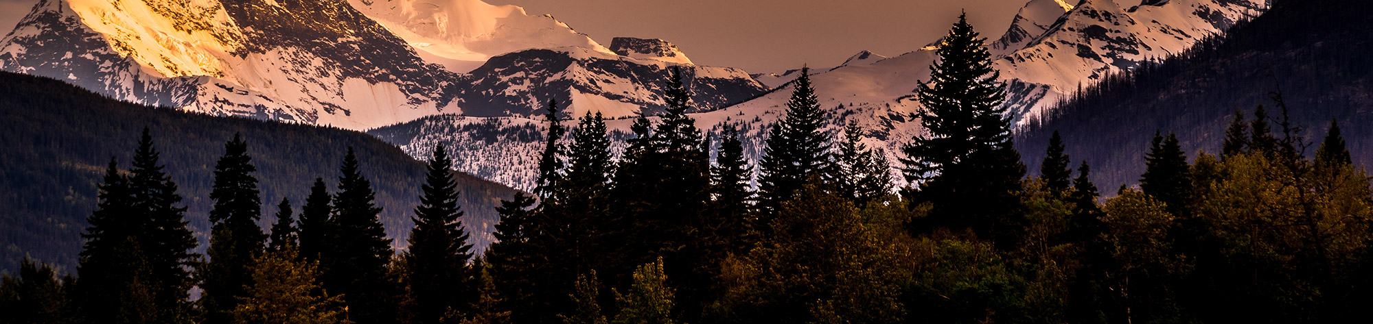 Sunset over Mount Chamberline and Mount Goslin in the Canadian Rockies in British Columbia, Canada