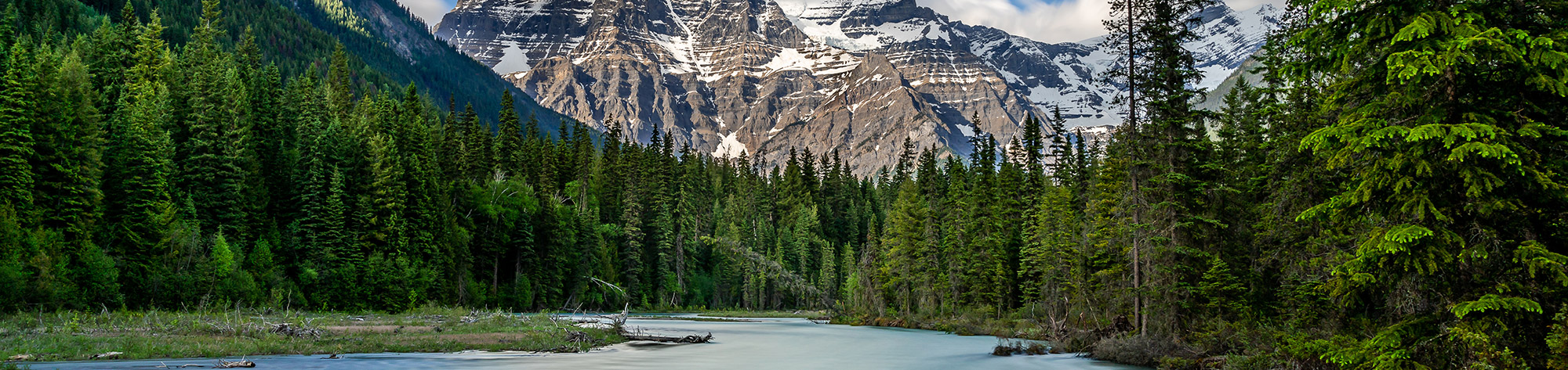 Robson River and a Cloud covered Mount Robson, in the Canadian Rockies, British Columbia, Canada